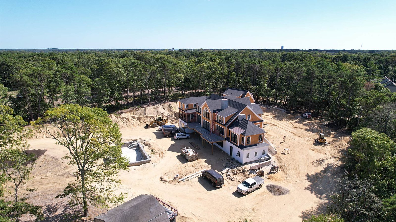 Natural stone masonry retaining wall construction at Edgartown Martha's Vineyard