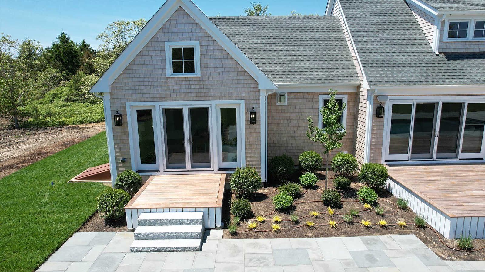 Standard tree and topiary planting, motor court island West Tisbury estate MV